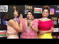 Actress Karunya Ram Tejaswini Prakash Teasing Anchor Kavya Shastri At SIIMA Red Carpet