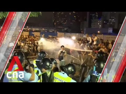 Hong Kong police arrest 19 after demonstration against extradition bill turns violent