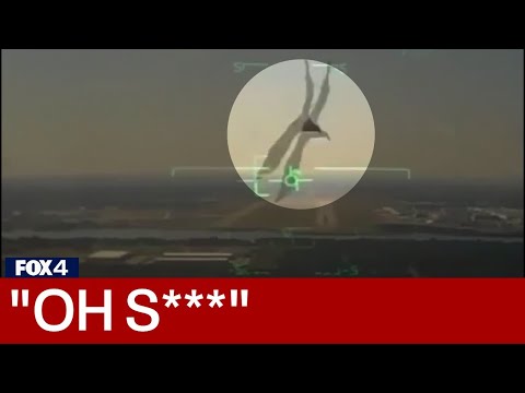 Navy jet hits bird causing it to crash into neighborhood