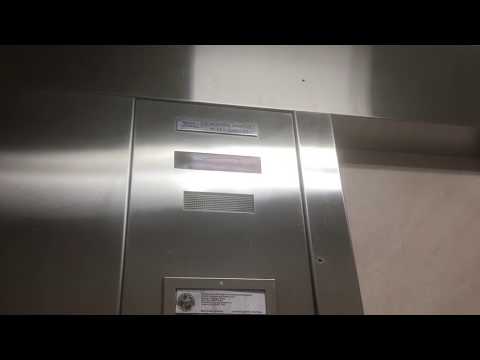 Worn 80s Dover Oildraulic Elevators - Main Plaza garage - Downtown, Sarasota, FL