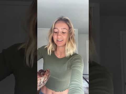 Girl cautiously handles a Goliath Birdeater Tarantula!
