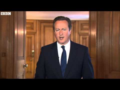 Cameron defends Calais crisis 'swarm' comment
