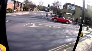 Clueless Porsche Driver tries to drive wrong direction down one way system