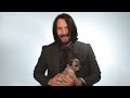 Keanu Reeves Plays With Puppies While Answering Fan Questions Keanu Reeves Plays With Puppies While Answering Fan Questions