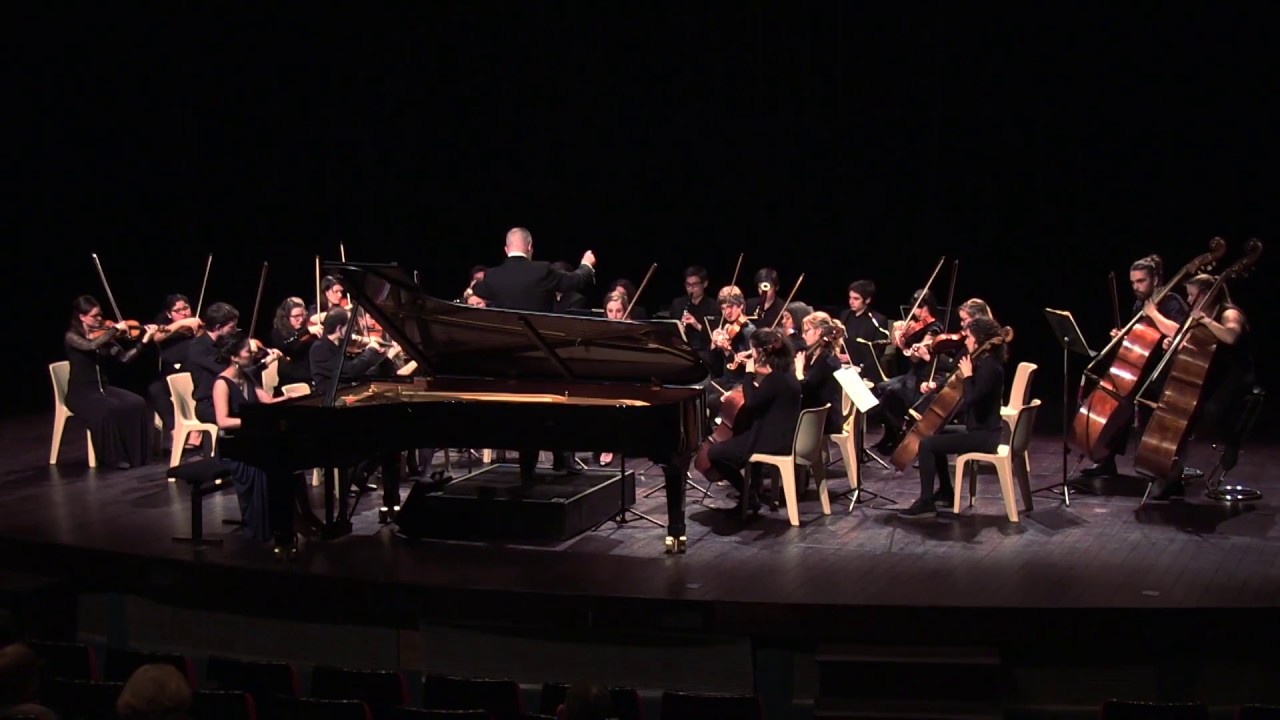 June Wu playing piano