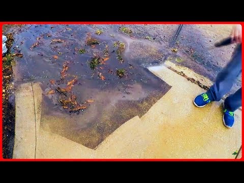 Pressure washing the driveway- satisfying!