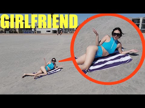 Using a DRONE to Annoy my Hot Girlfriend on the beach while she tans (She was MAD)