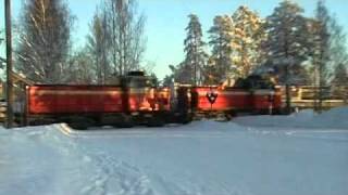 Freight train 4205 passes Sairaala level crossing