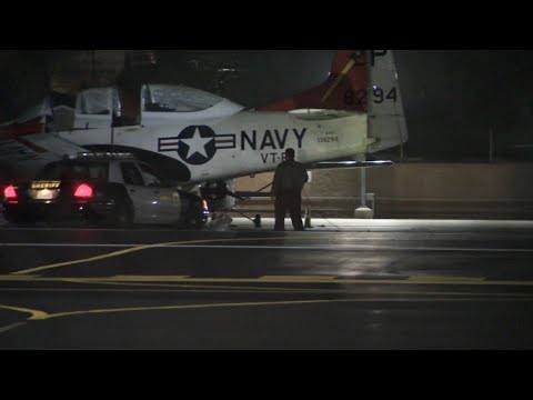 Two planes collided on a Los Angeles-area runway on Wednesday, authorities said. A single-engine plane caught fire. KABC-TV reports its pilot died. The other plane is a T-28, reportedly with Vietnam War era markings. Its pilot was hospitalized. (March 14)