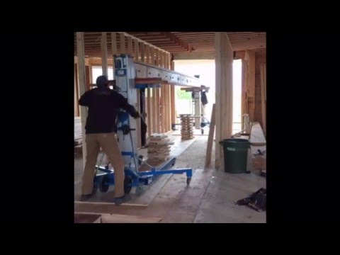 1300lbs steel beam install with genie lifts