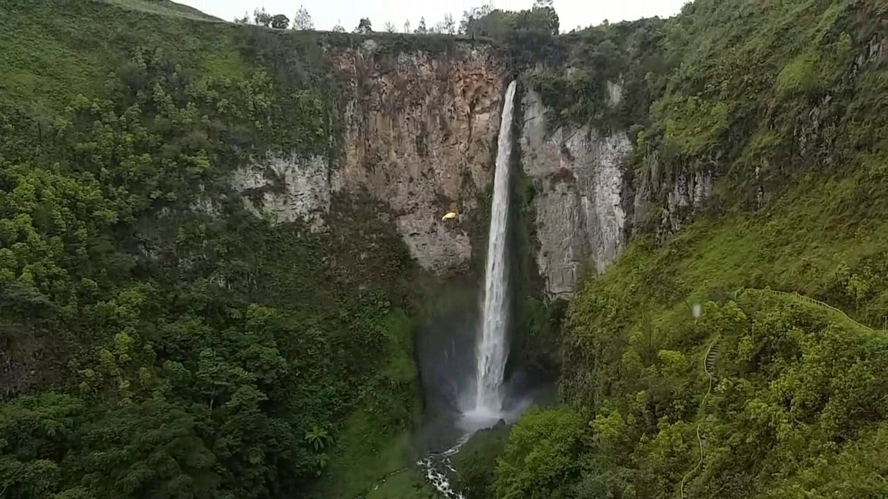 BASE jumping in Indonesia  Waterfall Sipiso Piso webm 720p