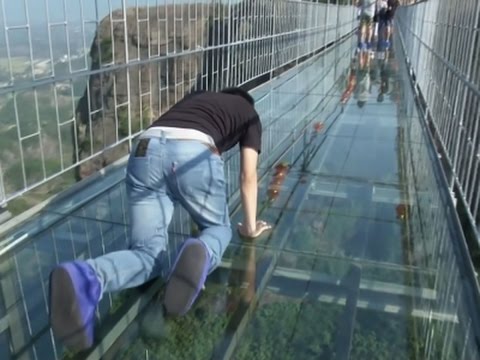 Raw: Tourists Brave Glass-Bottom Bridge
