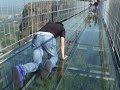 Raw: Tourists Brave Glass-Bottom Bridge