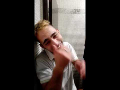 Drunk man. Crazy smile in wc Portugal Alvor
