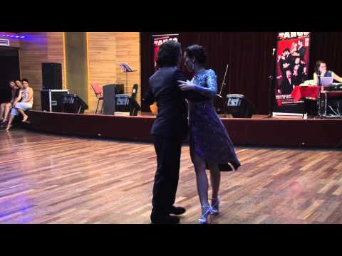  Leonel Hung-Yut Chen  and  Hwayi Florencia  are  dancing  to  a  tango  at  Shanghai Tango Marathon  in  2014