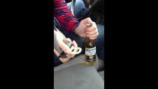 how to open a beer with your seat belt