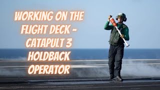 Working on the Flight Deck - Catapult 3 Holdback Operator