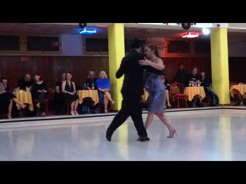  Lily Tan  and  Gennysam Alcantara  are  dancing  to  the  tango  "  Dime Mi Amor  "  by  Juan D'Arienzo  at  Salonissimo Savona Tango Festival  in  2017