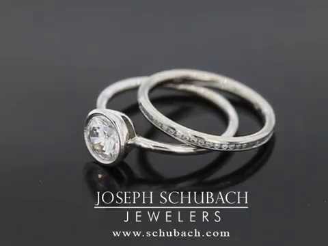 Round channel set diamond band with our round bezel set engagement ring