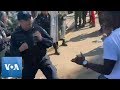 Mexico: Police Clash With Migrants Outside Immigration Center
