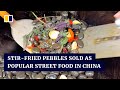 Stir Fried Pebbles Sold As Popular Street Food In China