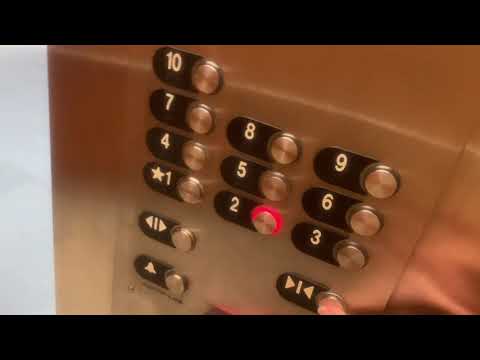 Interesting (Slap on) Otis Series 2 Elevonic 401's at echo parking garage, West Palm Beach, FL