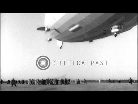 Airship LZ 129 Hindenburg makes landing at Lakehurst Naval Air Station in New Jer...HD Stock Footage