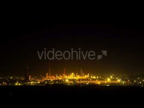 View of a Glowing Refinery at Night | Stock Footage - Videohive