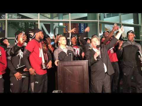 USC AD Ray Tanner talks with crowd at team arrival