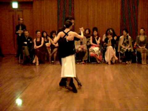  Kyoko Yamao  and  Hiroshi Yamao  are  dancing  to  the  tango  "  Nada  "