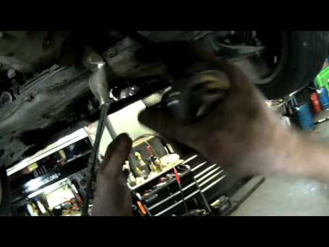 To remove stubborn rusty nuts on the exhaust system... use a bit of heat!