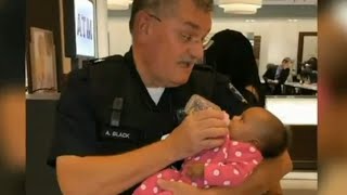 Police Officer Feeding Tiny Baby Negative Stories of Racism Cops Picture Shows Different Story