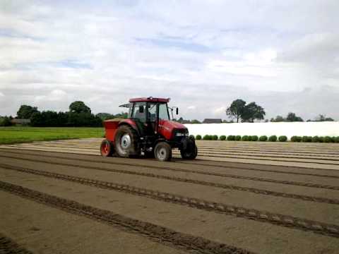 case met zandstrooier,achtmaal