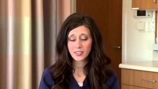 What causes white spots and swelling on tonsils, and should I see a doctor