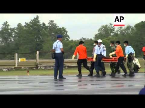At least three more bodies from the AirAsia Flight 8501 crash were brought to land on Monday. Improv