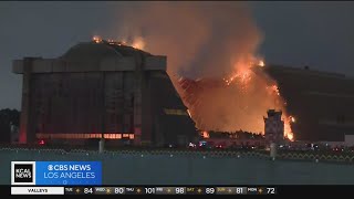 Inferno continues to burn at iconic WWII blimp hangar in Tustin