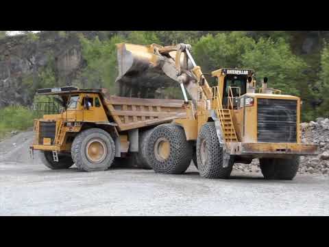 Heavy Construction Machines in Action CAT 777C and CAT 992G - ConEquip Parts