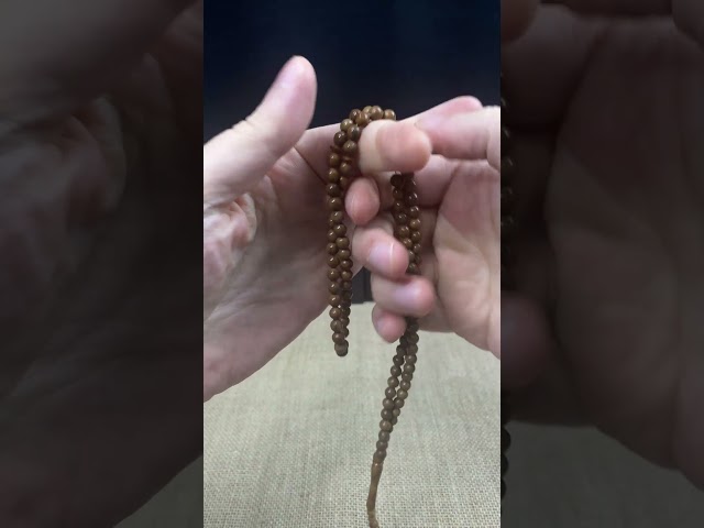 سبحة كوك طبيعي بحبات دائرية صغيرة وشرابة سيستملي