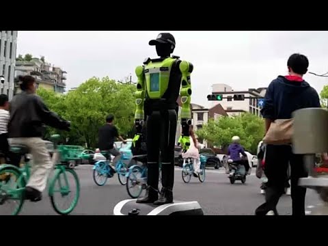 Video Thumbnail: Humanoid robots deployed to direct traffic in China