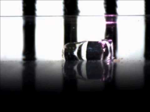 Sub-mm thrust-in-water powered by a remote laser pulse - rocket-in-water