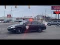 5 Saginaw MI police cars and MSP responding to a officer needing assistance