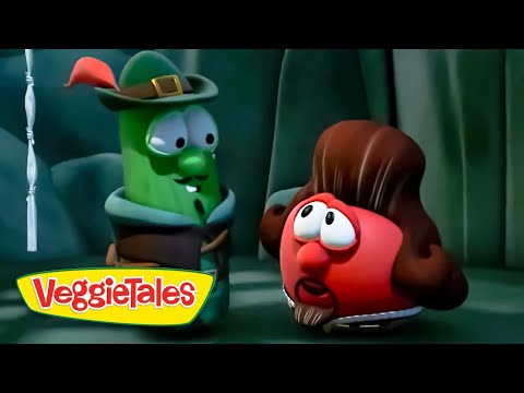 Green cucumber wearing a hat talks to a red rounded veggie in a cave; VeggieTales logo visible at bottom left.