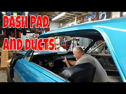 Classic mustang dash pad, A/C vents, and trim installed. Jade part 85.