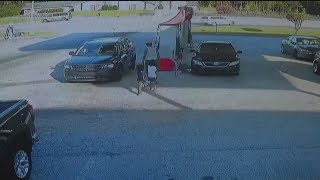 Surveillance video shows moments father left young sons with car containing loaded gun