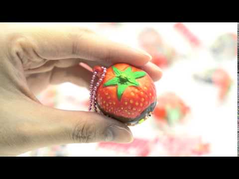 strawberry with chocolate sauce sprinkles squishy charm / spongy charm