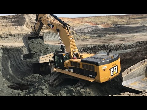 Caterpillar 390D Excavator Loading Caterpillar 773 Dumpers - Interkat SA