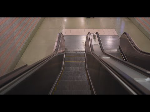 Sweden, Stockholm Södra Train station, 1X escalator - going down to platform level