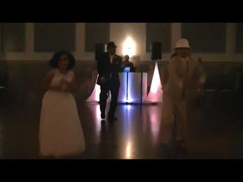 Bride's family surprises her at reception with dance