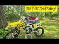 Riding A Technical Trail On A Motocross Dirt Bike