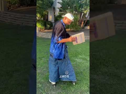 Can Jnco jeans hold a Super Nintendo with Air Dolphin #1990s #baggypants #jnco #nintendo